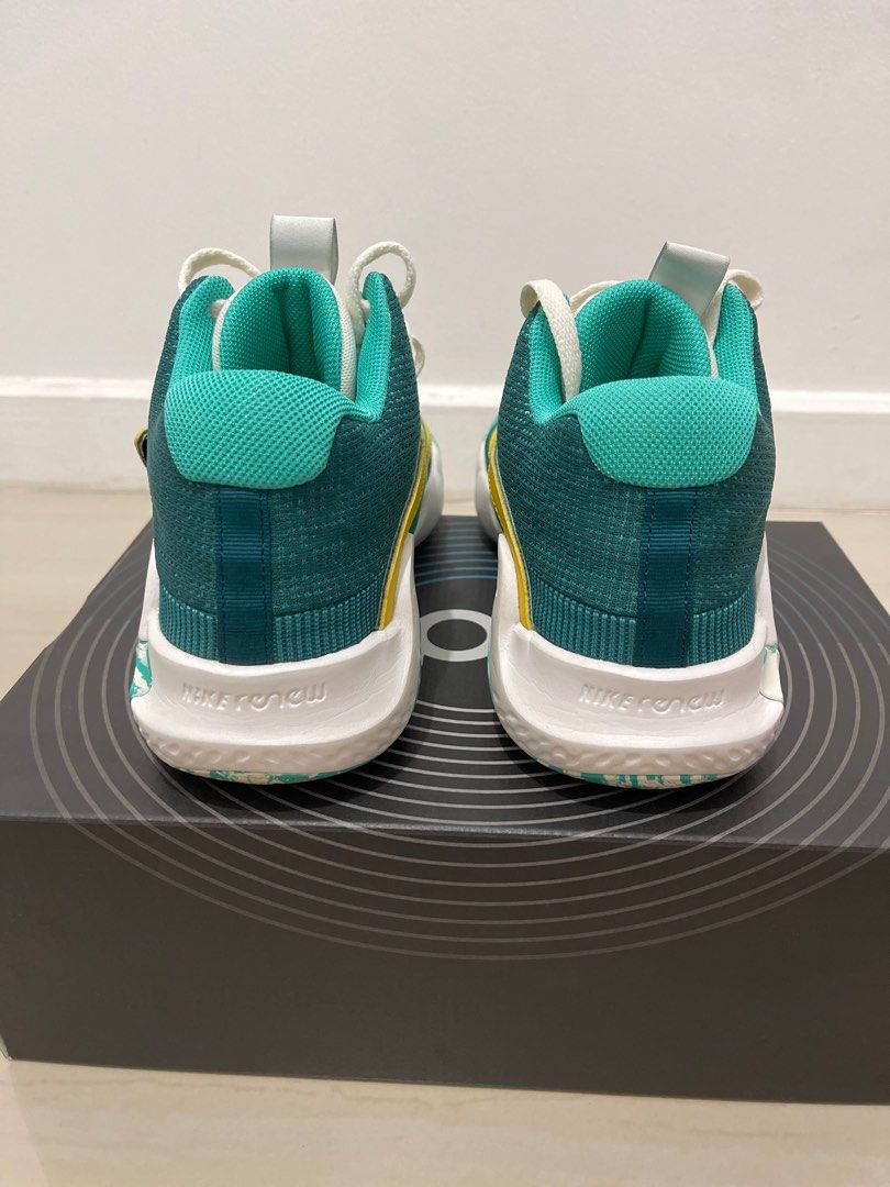 Nike KD Trey 5 X EP (Category: Sneakers) located in Cavite. Submitted by sjlav (Listing ID 1409778757, Image 3). Description: Nike KD Trey 5 X EP sneakers in teal and yellow. Mid-top design with midfoot strap. Size US 9. Includes box. Used few times only. Very good condition..