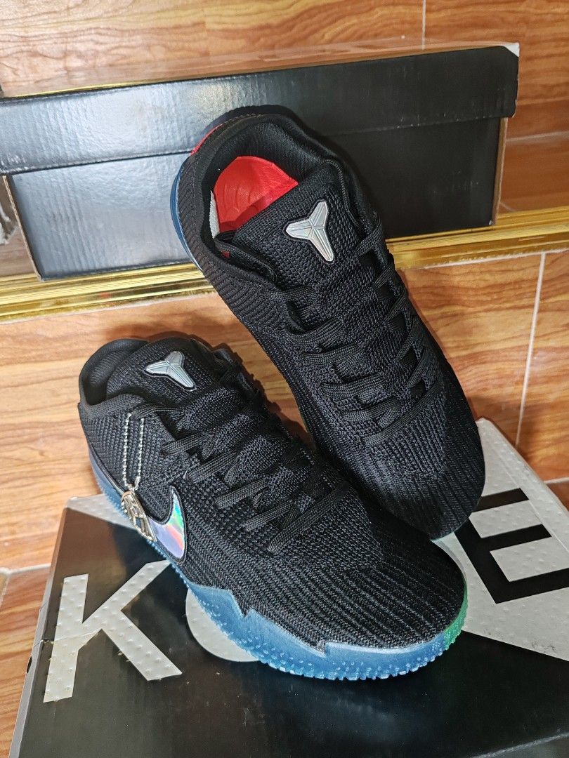 Nike Kobe AD NXT 360 Black Silver (Category: Sneakers) located in Baguio. Submitted by pop_up_items (Listing ID 1409716163, Image 1). Description: - Nike Kobe AD NXT 360 sneakers - Black knit upper - Holographic swoosh - Blue and green sole - Size: 8.5 (US) - Includes original box.