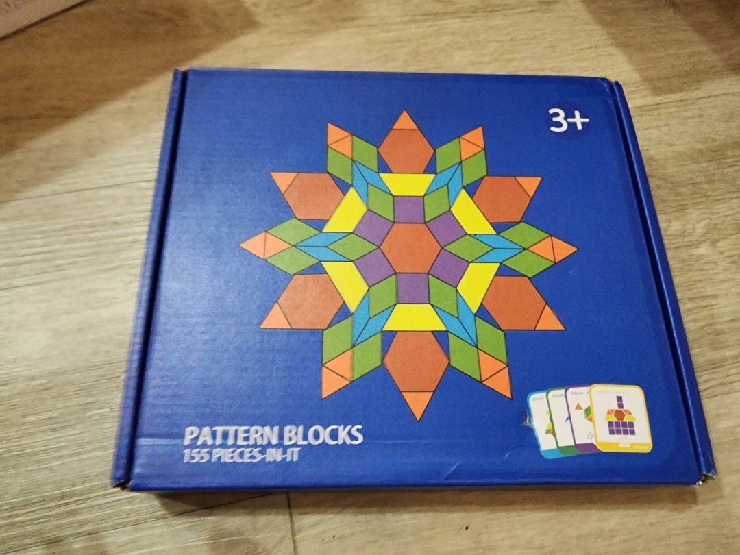 Pattern Blocks 155 Pieces (Category: Educational & Learning Toys) located in Singapore. Submitted by hexnscents (Listing ID 1409710821, Image 1). Description: - 155-piece pattern blocks set - Suitable for ages 3+ - Includes pattern cards - Encourages creative play and learning - Develops spatial reasoning - Enhances problem-solving skills.