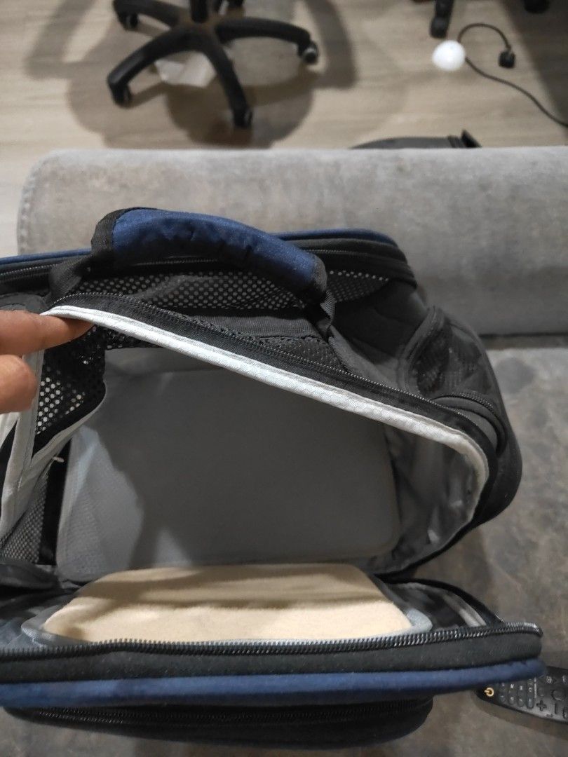 Pet Back Pack Small pets (Category: Homes & Other Pet Accessories) located in Singapore. Submitted by singlemooom (Listing ID 1409800982, Image 3). Description: - Durable blue pet back pack - Multiple compartments (zippered main, mesh pocket) - Convenient handle - Used 2 times only for my baby Golden now he is grown up letting go as not using at all. -Good condition and well taken care.