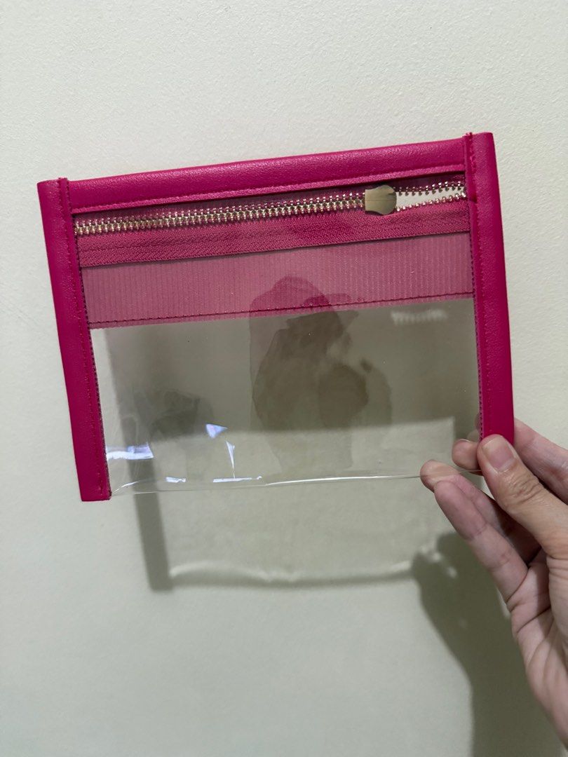 Pink Clear Pouch with Gold Zipper (Category: Purses & Pouches) located in Quezon City. Submitted by _cmls (Listing ID 1409709420, Image 2). Description: - Pink pouch with a clear front panel - Features a stylish gold zipper - Rectangular shape - Made with a combination of materials - Ideal for storing and organizing items.