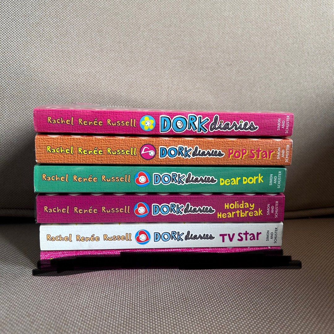 [PROMO PRICE] Dork Diaries Book Set (Category: Children's Books) located in Mandaluyong City. Submitted by ysxbelx (Listing ID 1409361158, Image 1). Description: - Dork Diaries Book Set - Pre-Loved but condition is Like New; Most books are wrapped with plastic cover - Bought from National Bookstore/Fully Booked/ Powerbooks Promo Price: 2 Dork Diaries Books for P300.00 Whole Set for P750.00 Location: Mandaluyong MOP: Gcash, Maya, BPI MOD: Delivery