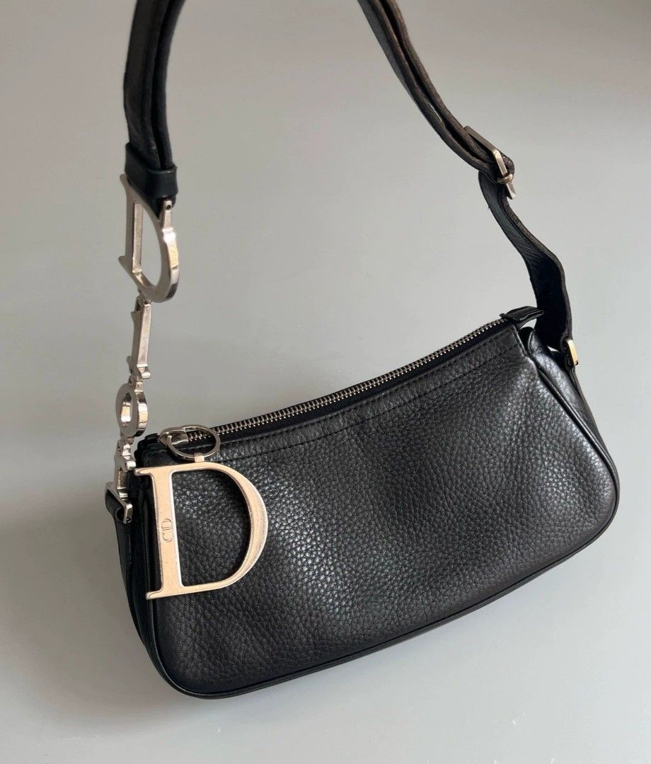 Rare Dior Spell Out Pochette Bag (Category: Luxury Bags & Wallets) located in Quezon City. Submitted by rarefindsgirlie (Listing ID 1407553811, Image 3). Description: (make sure to read the full description) ‼️note: 1st pic is for thumbnail/ref only - vintage christian dior -in good condition/with only signs of use -production date code 08-bo-1025, (december 2005) - measurements: approx 10 x 5 x 2 -extremely rare dior charm pochette in buttery so