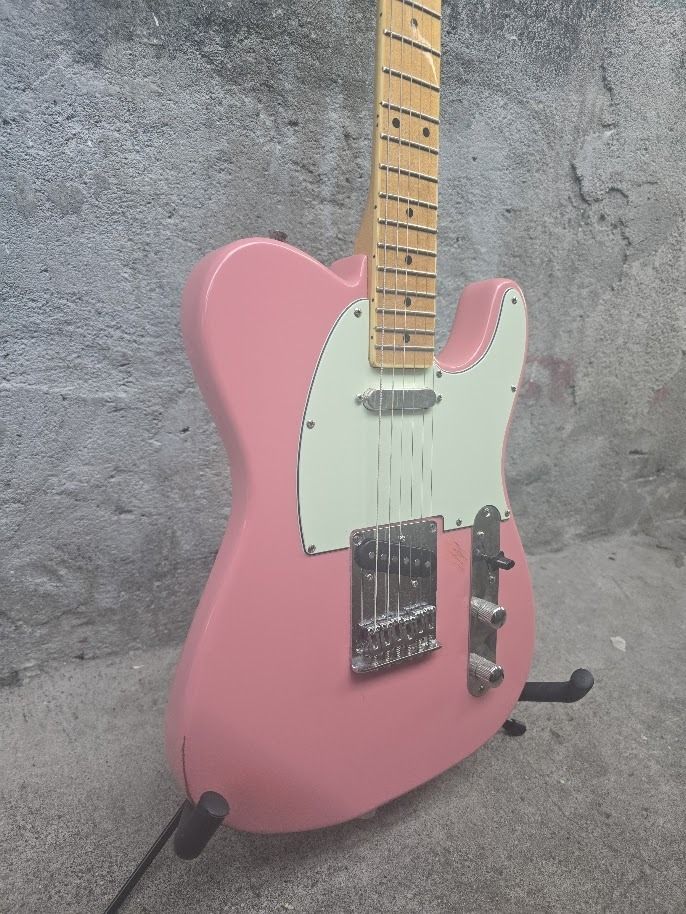 SX VTG Series Telecaster (Category: Musical Instruments) located in Subic. Submitted by jaminalraymond21 (Listing ID 1409706851, Image 3). Description: SX VTG Series Telecaster Repainted to Shell Pink. Has some minor scratches. Ash body Maple neck Merong arm and belly cut for more comfortable playing. Upgraded na rin ang neck and bridge pickups. Control plate upgraded na rin. Makikita mo yung switch selector na naka-angled, so mas mabilis ang swi
