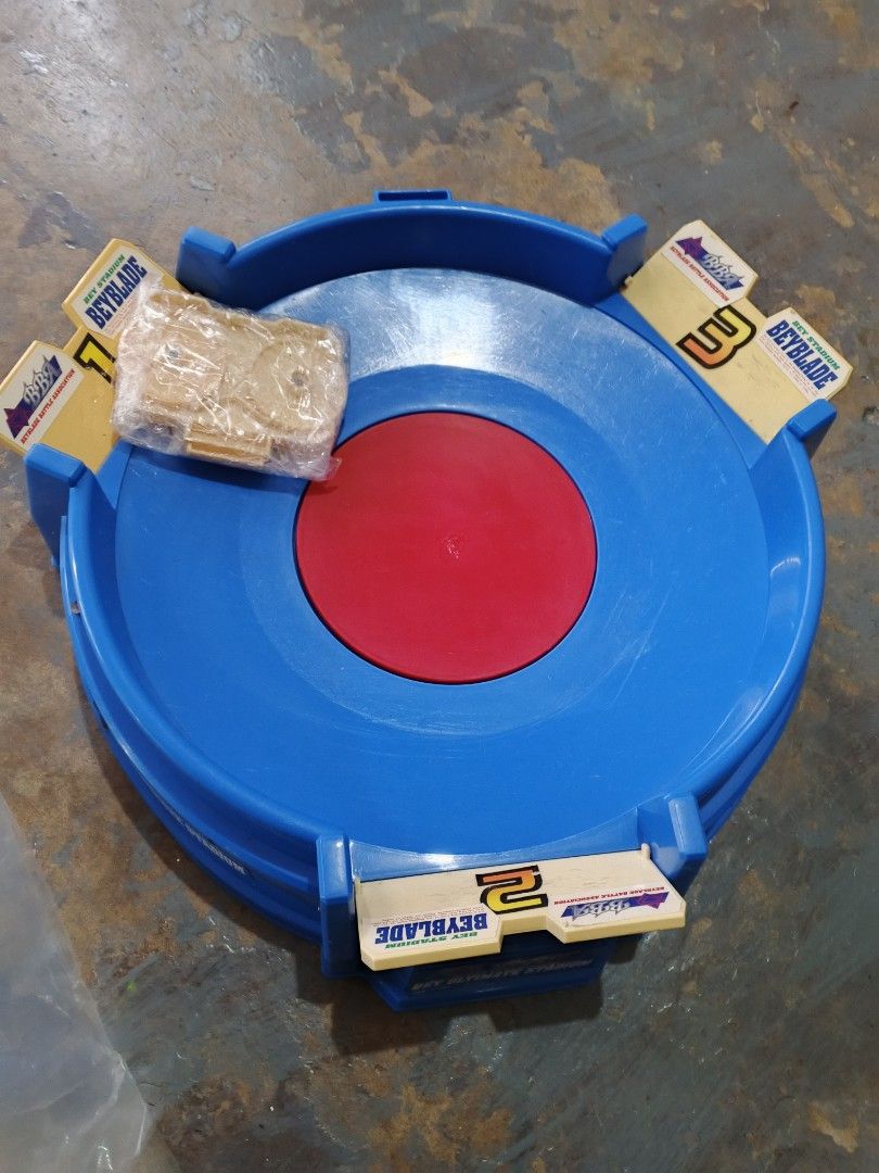 Vintage Beyblade Ultimate Stadium Gen 1 (Category: Action & Battle Toys) located in Caloocan City. Submitted by astrid192372691 (Listing ID 1409800389, Image 2). Description: - Beyblade Ultimate Stadium set. - Includes stadium and accessories. - Black Dranzer Not Included .