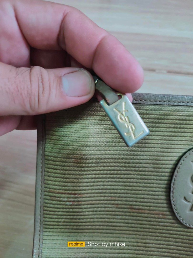 VintageYsl clutch bag (Category: Luxury Bags & Wallets) located in Cabuyao City. Submitted by mhikethrifters (Listing ID 1409768973, Image 2). Description: Vintage ysl clutch bag Authentic Leather materials Need restoration With minor stain Issue! And no major issue For only 480+shipping fee Dm.