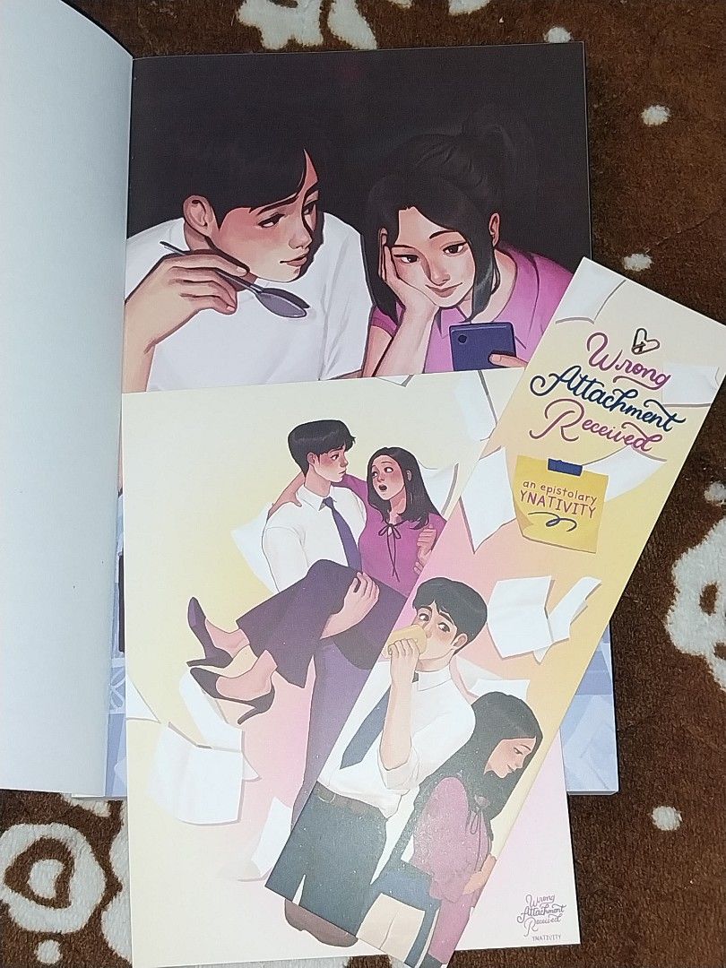 Wattpad book - Wrong Attachment Received by Ynativity (Category: Storybooks) located in Iloilo. Submitted by graecel22 (Listing ID 1409642575, Image 2). Description: - "Wrong Attachment Received" by Ynativity - Epistolary novel - Includes postcard and bookmark - Clean pages.