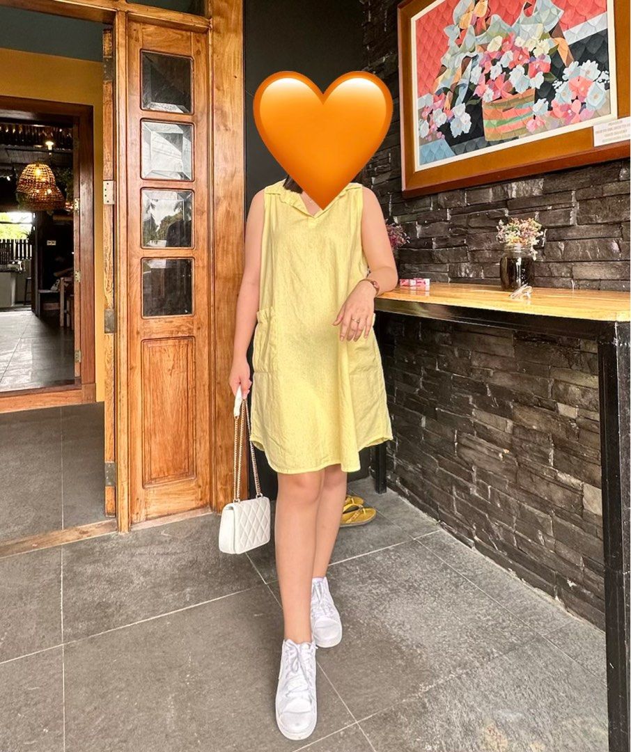 Yellow Sleeveless Dress (Category: Dresses) located in Manila. Submitted by cazly (Listing ID 1409629749, Image 1). Description: Messaege me for last price. - Yellow sleeveless dress - Collared neckline - Two front pockets - Above-the-knee length - Modelled with white sneakers and a white quilted handbag.