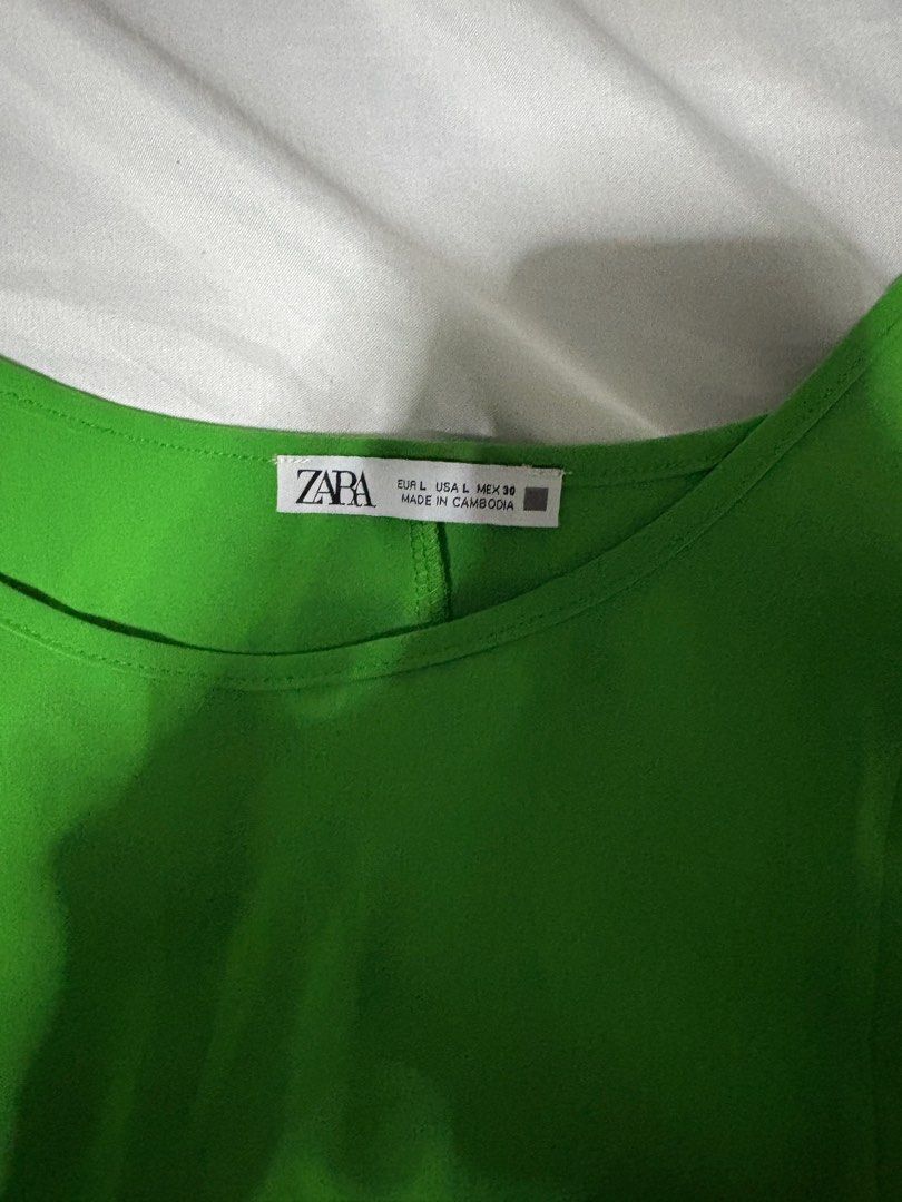 Zara Green Slip Dress (Category: Dresses) located in Quezon City. Submitted by authentic_c (Listing ID 1409719390, Image 2). Description: - Zara green slip dress - Size: L - Features adjustable straps - Flattering silhouette - Versatile for casual or evening wear - Lightweight and comfortable fabric.