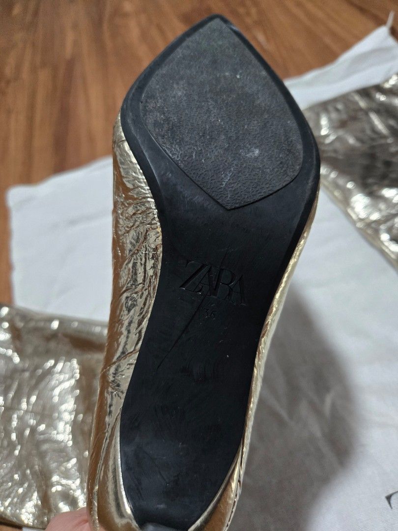 Zara Metallic Knee High Boots size 36 (Category: Boots) located in Quezon City. Submitted by bk2025 (Listing ID 1409786842, Image 3). Description: - Zara metallic knee-high boots - Pointed toe - Mid-height heel - Includes Zara dust bag - Unique textured metallic finish - Zara logo on sole.