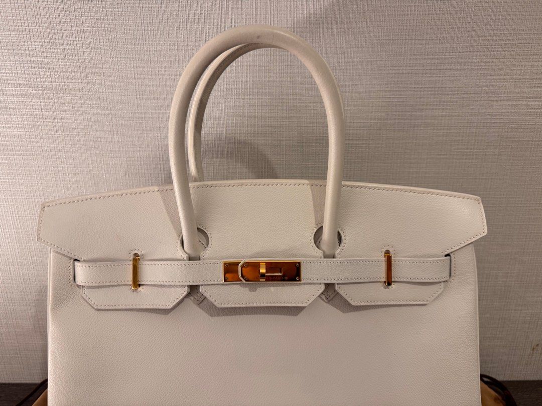 Birkin 35 (Category: Luxury Bags & Wallets) located in Manila. Submitted by appleberryb (Listing ID 1409926634, Image 2). Description: Birkin 35 bought it at osaka; with receipts Your Birkin details • Model: Birkin 35 • Year: 2000 (□C) • Color: White • Leather • Hardware: Gold • Lock: Leather clochette with gold lock.