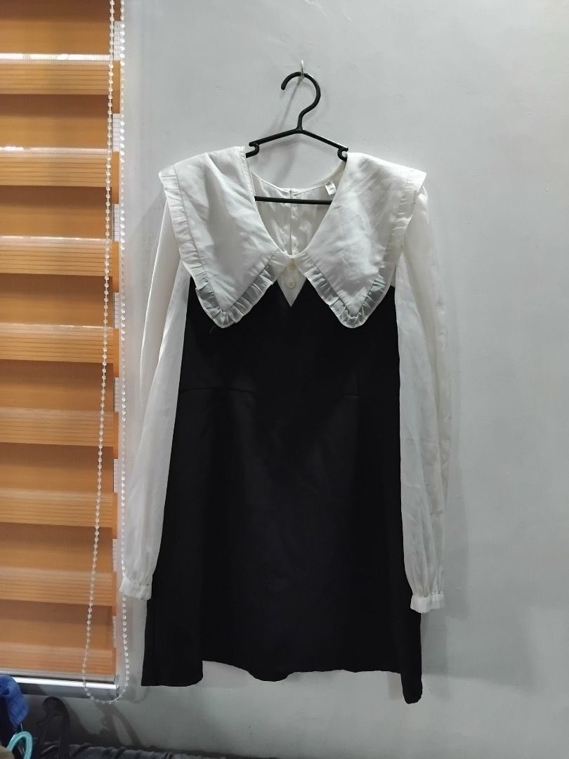 Black and White Peter Pan Collar Dress (Category: Dresses) located in Bulacan. Submitted by 01.soleil (Listing ID 1409929412, Image 1). Description: - Black mini dress - size: M - length: 31 - White Peter Pan collar and sleeves - with zipper at the back - Long sleeves.