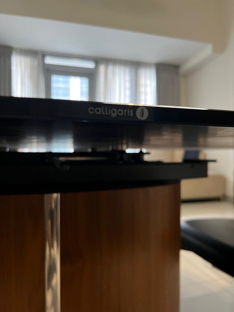 Calligaris Odyssey Dining Table set (Category: Tables & Sets) located in Mandaluyong City. Submitted by jadeyroo (Listing ID 1409906322, Image 3). Description: For sale Calligaris Odyssey Dining Table - retails at ~4600usd - Italian designer furniture - dining table is extendable (see pic) - column: walnut chrome Dimensions: 29.6” H x 100.5” W x 41.3” D, 324.1 lbs. Comes with 6 Calligaris Etoile dining chairs - retails at ~800usd/chair - seat: le