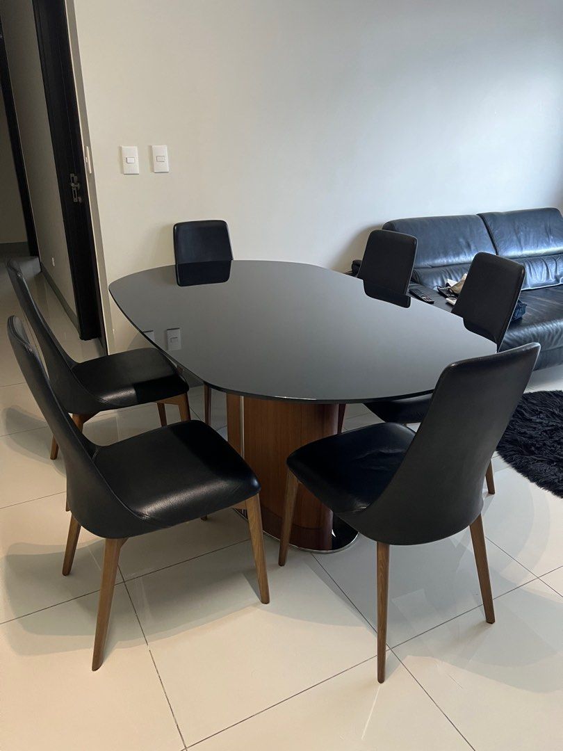 Calligaris Odyssey Dining Table set (Category: Tables & Sets) located in Mandaluyong City. Submitted by jadeyroo (Listing ID 1409906322, Image 1). Description: For sale Calligaris Odyssey Dining Table - retails at ~4600usd - Italian designer furniture - dining table is extendable (see pic) - column: walnut chrome Dimensions: 29.6” H x 100.5” W x 41.3” D, 324.1 lbs. Comes with 6 Calligaris Etoile dining chairs - retails at ~800usd/chair - seat: le