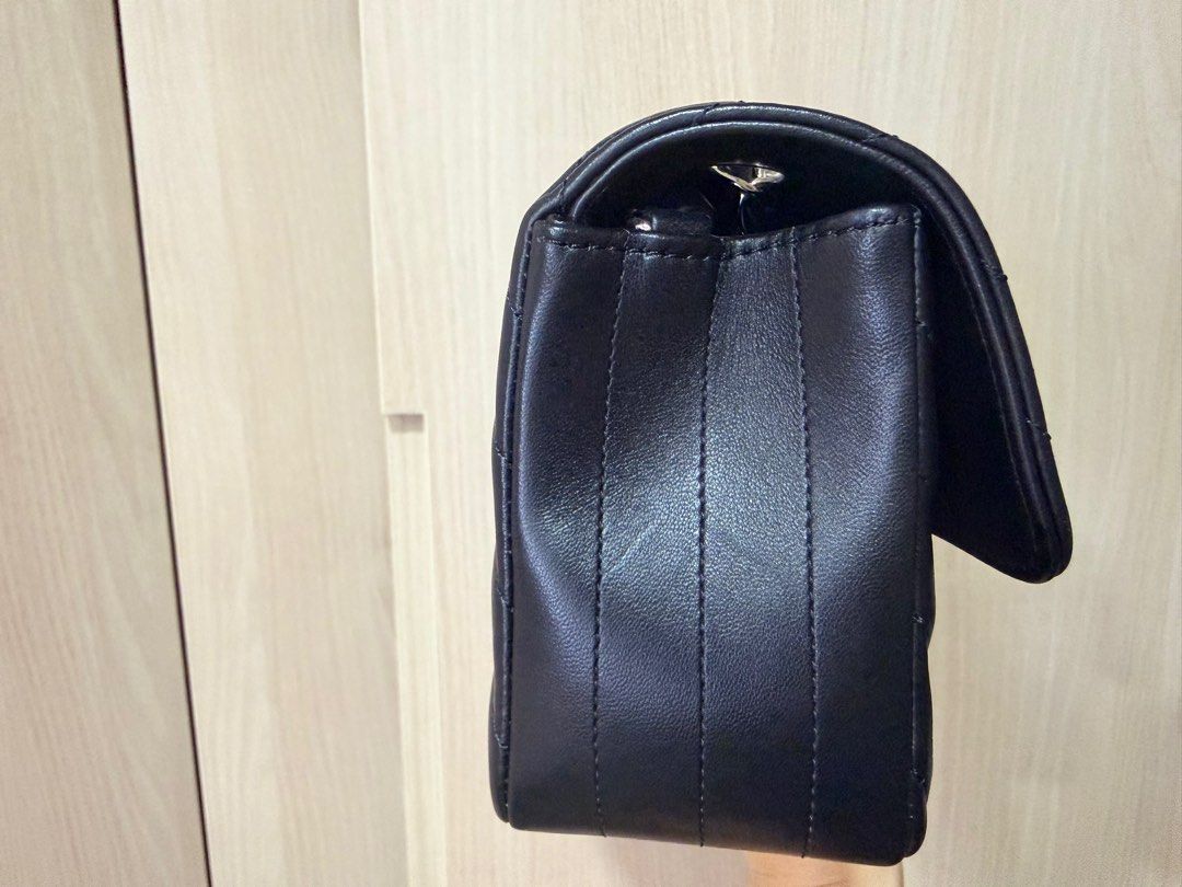 Chanel mini rectangle (Category: Bags & Wallets) located in Singapore. Submitted by runway (Listing ID 1409881021, Image 3). Description: Used, 8.5/10 - NOT FOR FUSSY Black lambskin in chevron quilted flap bag, silver hardware Some surface scratches at the side of the bag and inner flap. Comes with receipt, box, dustbag. No NEGO Meetup at Tampines (my blk) to deal.