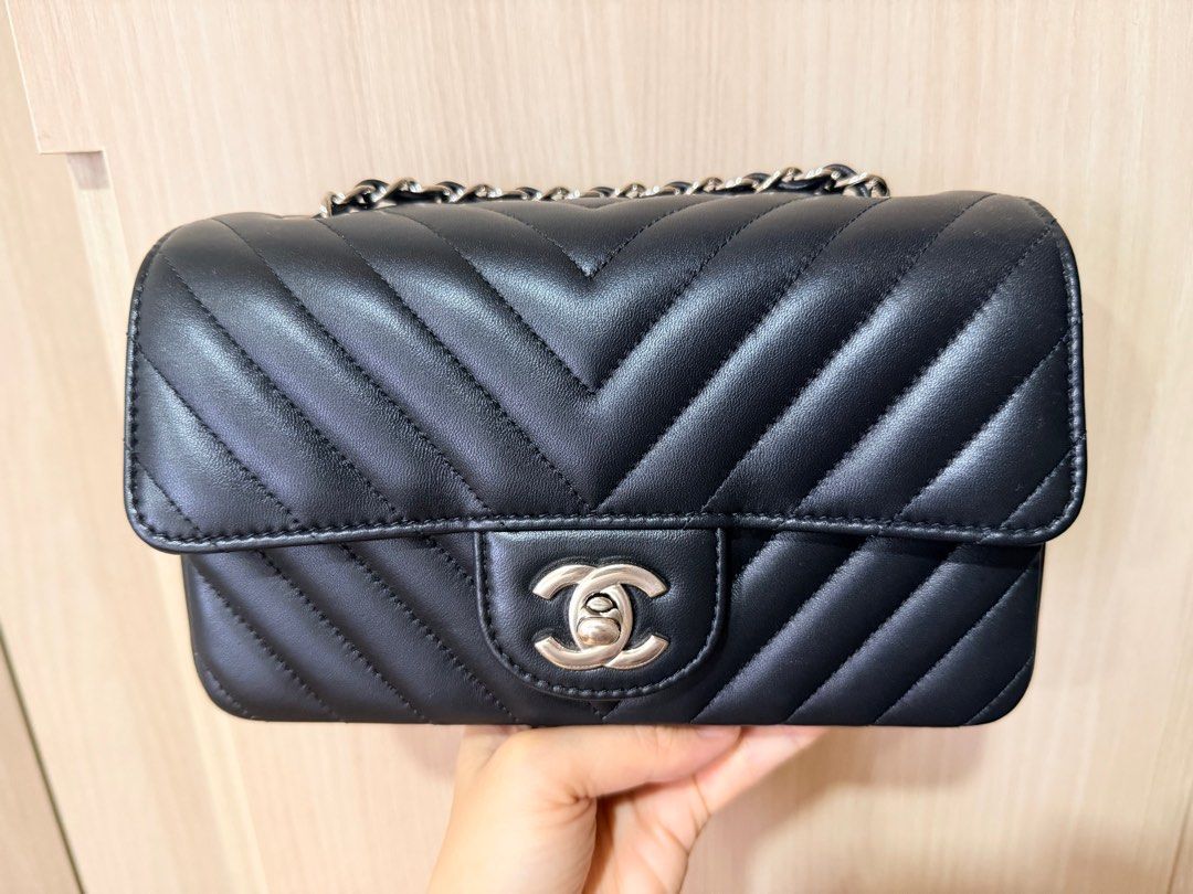 Chanel mini rectangle (Category: Bags & Wallets) located in Singapore. Submitted by runway (Listing ID 1409881021, Image 1). Description: Used, 8.5/10 - NOT FOR FUSSY Black lambskin in chevron quilted flap bag, silver hardware Some surface scratches at the side of the bag and inner flap. Comes with receipt, box, dustbag. No NEGO Meetup at Tampines (my blk) to deal.