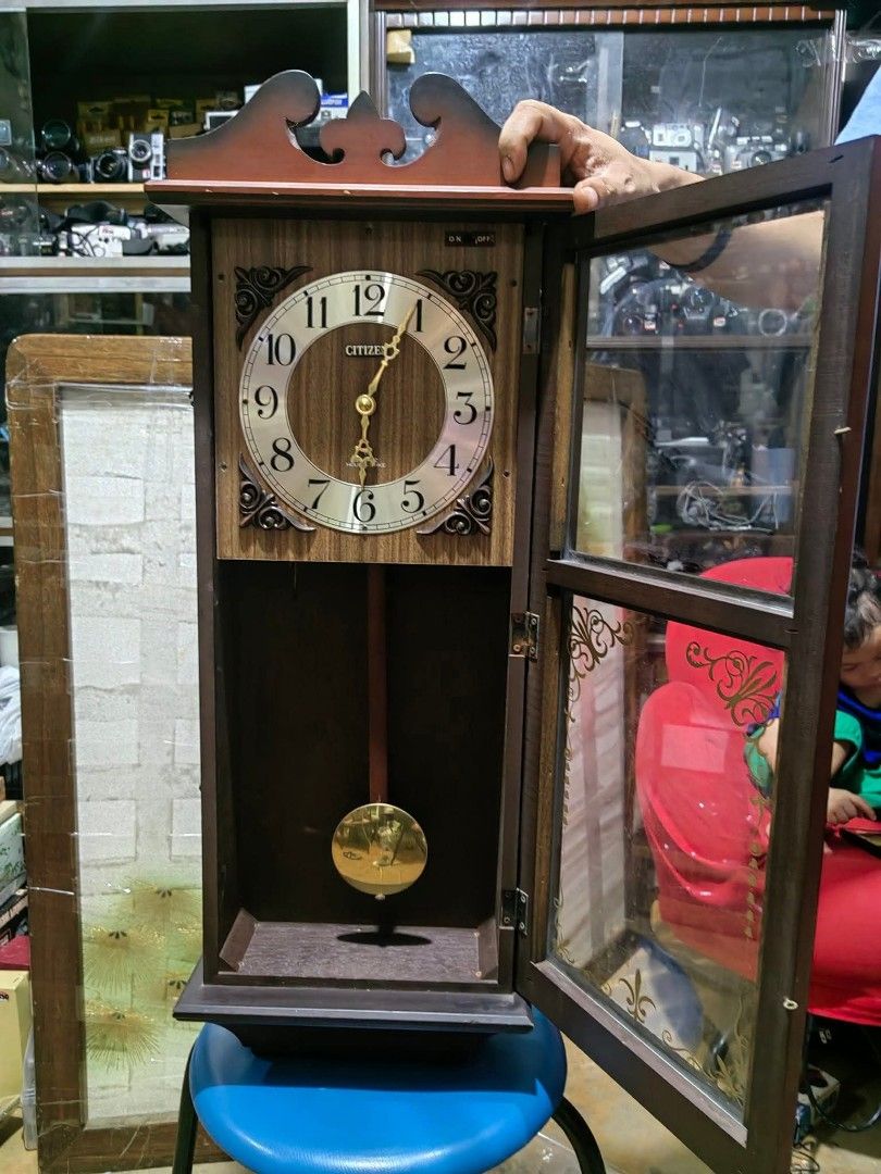 Citizen Pendulum Wallclock Quartz Hour Strike (Category: Clocks) located in Cebu City. Submitted by dudes_villanueva (Listing ID 1409960870, Image 2). Description: Citizen Pendulum Wallclock Quartz Hour Strike 📌In very good condition. Few wood scratch. Can be restored. 📌Working Hourly strike and every 30 minute single strike. 📌1 Type D battery operated. 📌Vintage style look with elegant modern clock face design. 📌Clock is not pendulum depende