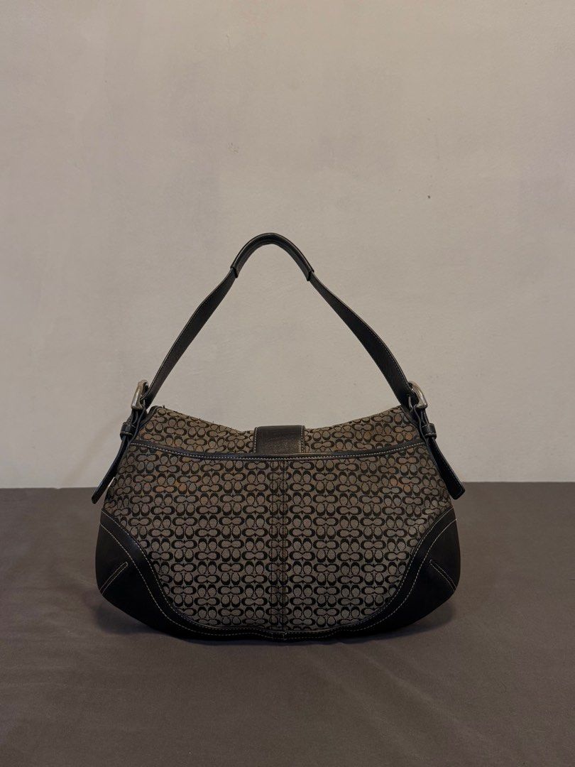 COACH Signature Grey Soho Shoulder Bag (Category: Luxury Bags & Wallets) located in Antipolo. Submitted by dscya_ (Listing ID 1409923159, Image 2). Description: - Pre-owned / Vintage (please review photos for details) - Authentic COACH - Silver Hardware - Medium Size - Grey Monogram - Personal Favorite (willing to keep) - H21cm W33cm D5cm Rfs: declutter Negotiable pm for details.