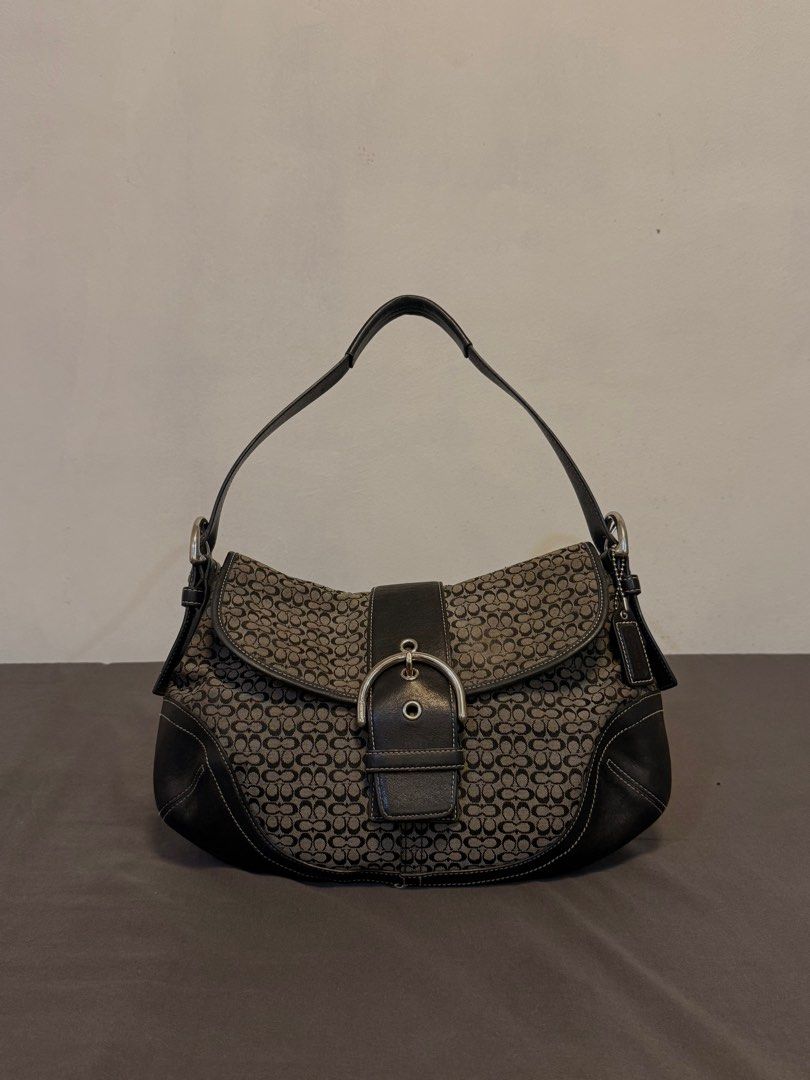 COACH Signature Grey Soho Shoulder Bag (Category: Luxury Bags & Wallets) located in Antipolo. Submitted by dscya_ (Listing ID 1409923159, Image 1). Description: - Pre-owned / Vintage (please review photos for details) - Authentic COACH - Silver Hardware - Medium Size - Grey Monogram - Personal Favorite (willing to keep) - H21cm W33cm D5cm Rfs: declutter Negotiable pm for details.