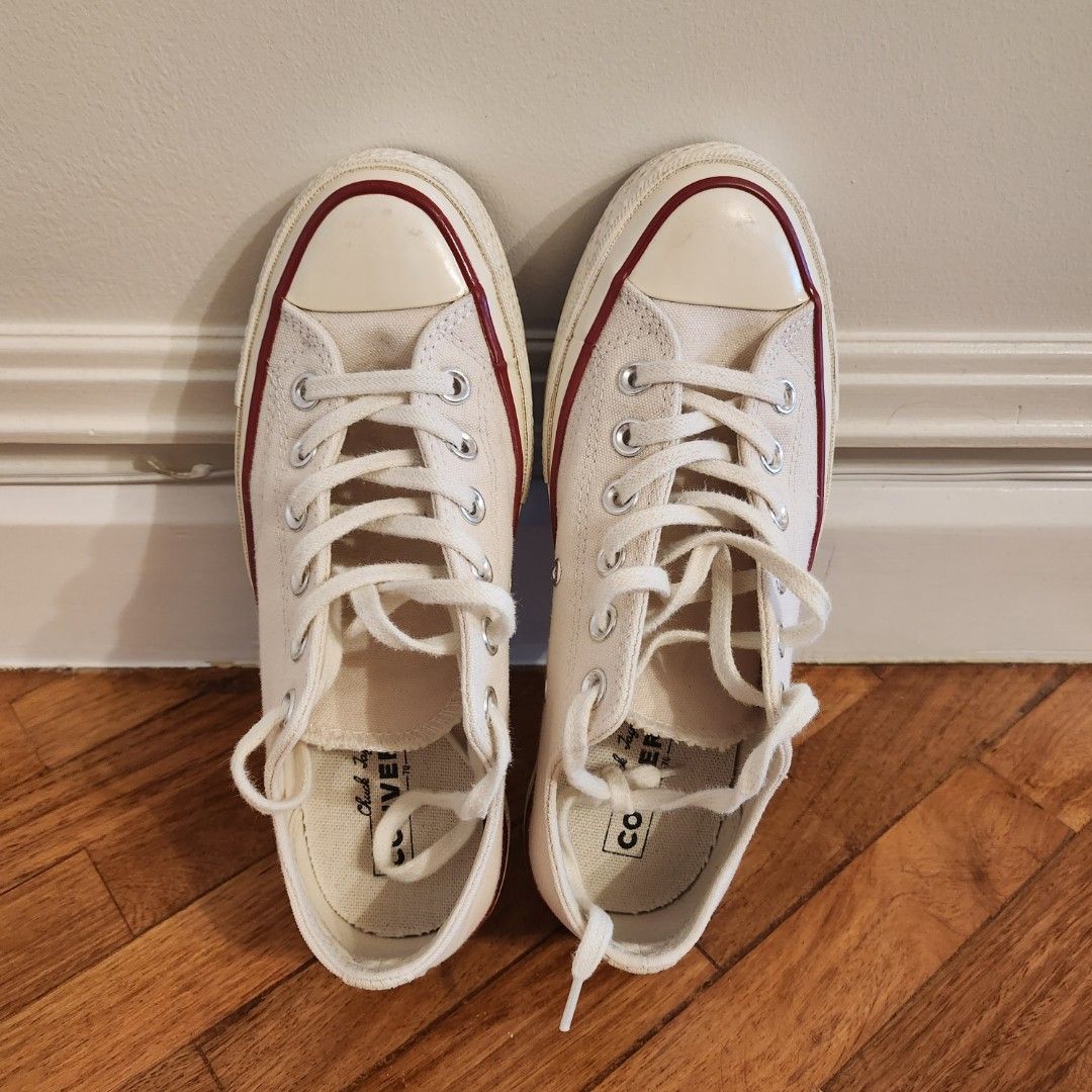 Converse Chuck 70 Low Top Ox/Parchment (Category: Sneakers) located in Makati City. Submitted by catfs (Listing ID 1409808162, Image 3). Description: - Bought in Powerplant Mall. - Cream-colored Converse Chuck 70 Low Top. - Classic design with cream canvas upper. - Red and black midsole accents. - Features the iconic Converse All Star logo. - Size: US Women's 6.5 / Men's 4.5. - Made in Vietnam..