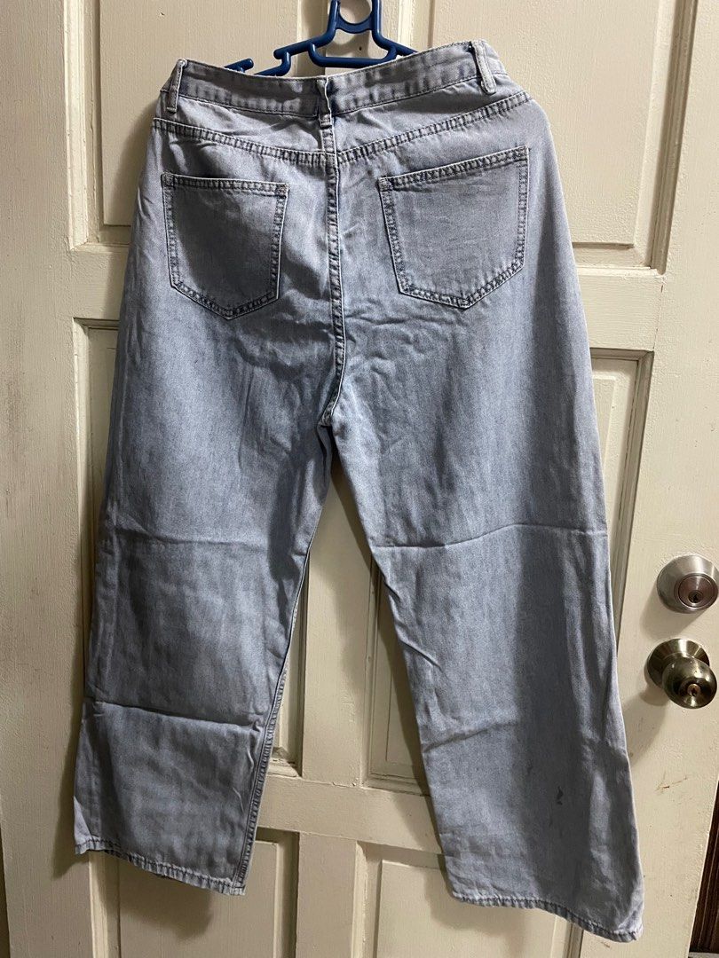 Denim Straight Leg Pants (Category: Jeans) located in Manila. Submitted by ava_declutters (Listing ID 1409979531, Image 2). Description: - S-M - 29-30 waist - Hight waist pants - Light Denim color - Has stain on bottom part.