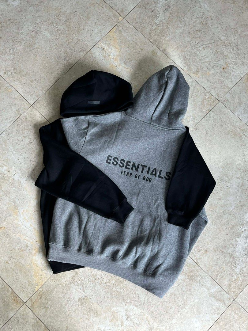 Essentials Fear of God Hoodie (Category: Hoodies) located in Amadeo. Submitted by _joeanna (Listing ID 1409910633, Image 1). Description: - Essentials Fear of God logo on the front. - Comfortable hood and long sleeves. - Available colors: Black, Gray, Beige. - Made of soft material. - Stylish and versatile for your wardrobe..