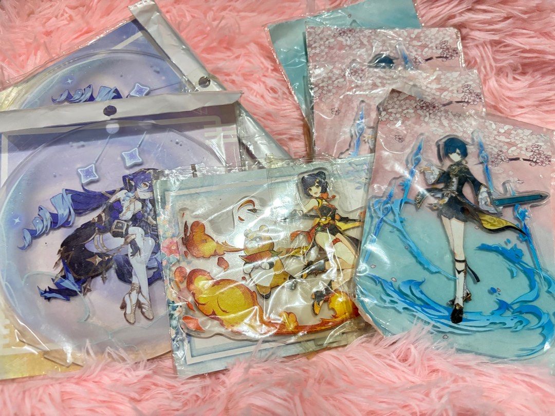 Genshin Impact Acrylic Standee (Category: Character Goods) located in San Fernando. Submitted by ladychinita07 (Listing ID 1409892460, Image 2). Description: - Genshin Impact acrylic standees - Characters: Layla, Xiangling, and Xingqiu - Brand new, in original packaging - Features vibrant colors and detailed artwork - Ideal for display and Genshin Impact fans.