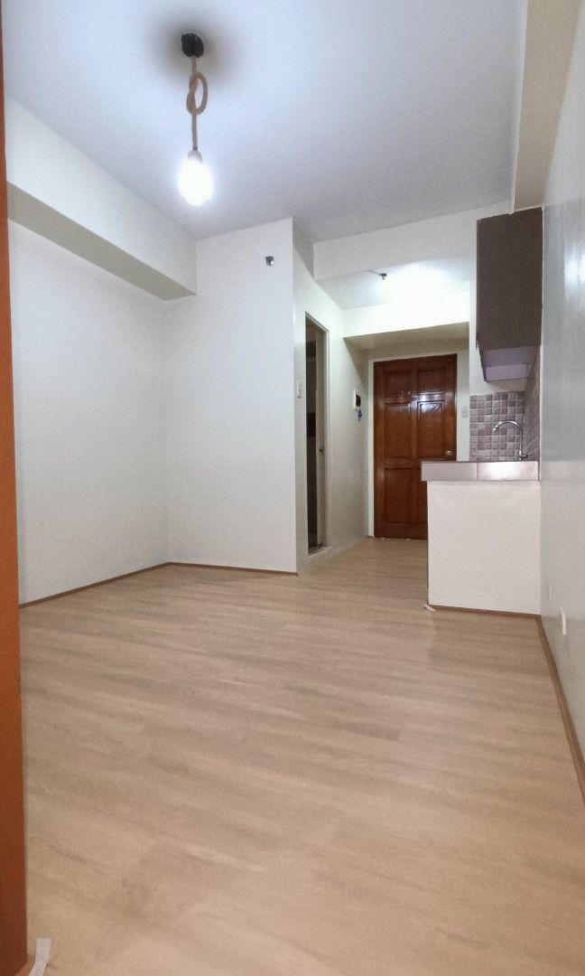 Grand Emerald Tower 1BR For Sale (Category: Apartments & Condos) located in Quezon City. Submitted by hamsterdad (Listing ID 1409105463, Image 2). Description: About The Unit: ✓ premium SPC flooring from "Floors to Walls" ✓ newly-painted interiors (beige and terracotta) ✓ newly-fitted bathroom fixtures including exhaust fan, towel bar, handheld shower and bidet ✓ newly-decorated kitchen splash board ✓ provision for water heater and range hood Abo