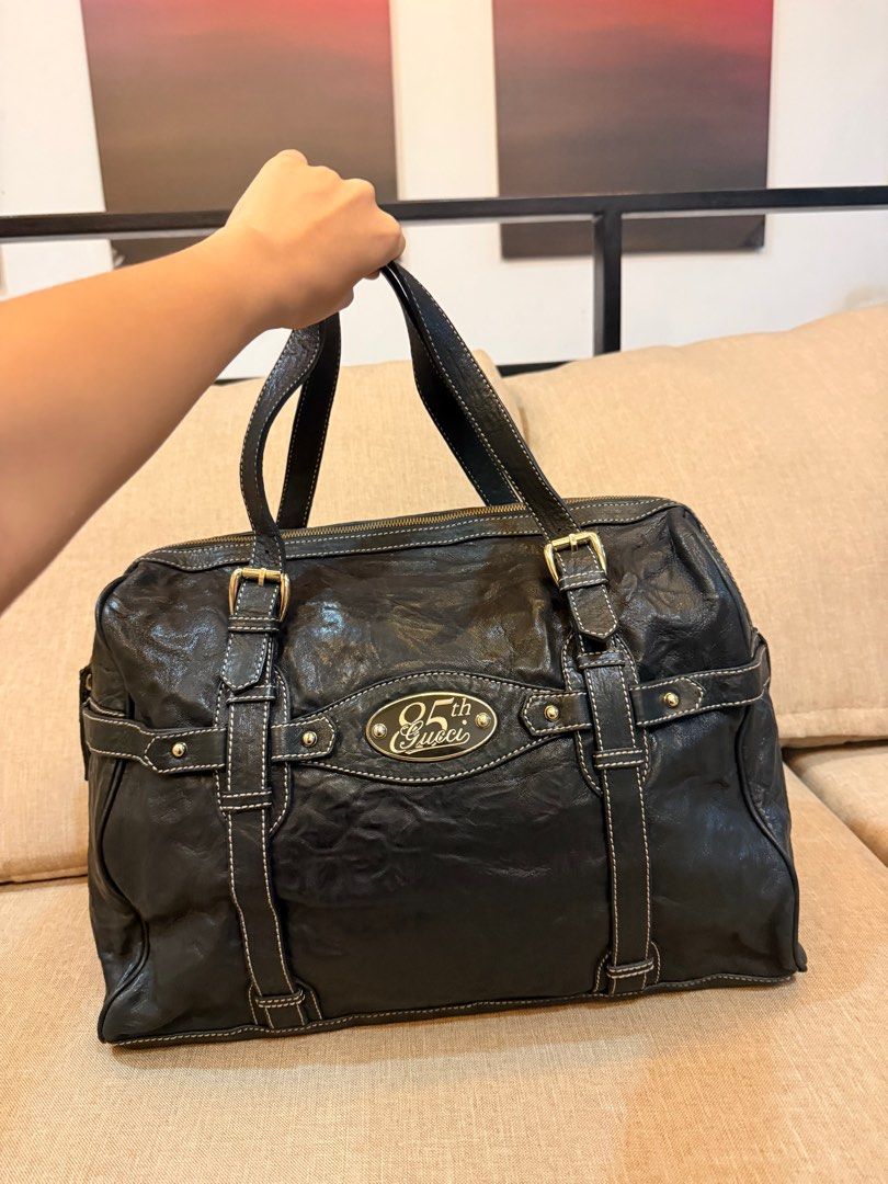 Gucci 85th Anniversary Black Boston Bag (Category: Luxury Bags & Wallets) located in Pasay City. Submitted by karlamarithe (Listing ID 1409975785, Image 2). Description: Gucci 2006 85th Anniversary Black Boston Bag Price: ₱23k -> ₱20k • Reasonable offers only Condition: Vintage | Good Description: Authentic Gucci 85th Anniversary Boston bag in black leather. Classic and rare commemorative design. Condition details (full disclosure): • Natural lea