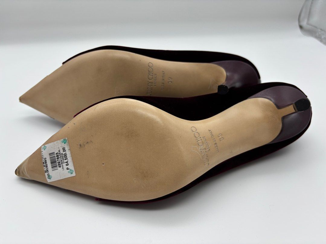 Jimmy Choo Pumps (Category: Heels) located in Pasig City. Submitted by dbhdeclutters (Listing ID 1409962278, Image 3). Description: - Jimmy Choo heels - Burgundy velvet - Pointed toe with mesh and leather detail - Size 39 - Includes original box and dust bag - Made in Italy.