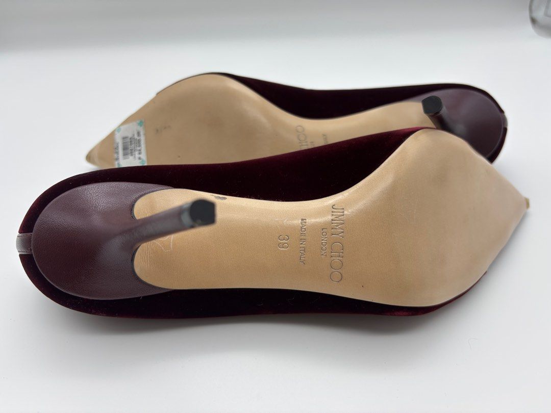 Jimmy Choo Pumps (Category: Heels) located in Pasig City. Submitted by dbhdeclutters (Listing ID 1409962278, Image 2). Description: - Jimmy Choo heels - Burgundy velvet - Pointed toe with mesh and leather detail - Size 39 - Includes original box and dust bag - Made in Italy.