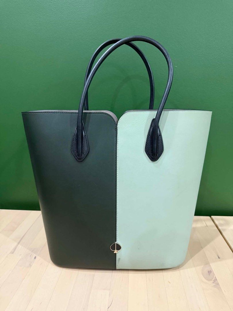 Kate Spade Nicola (Category: Luxury Bags & Wallets) located in Manila. Submitted by sample_only (Listing ID 1409858421, Image 1). Description: Kate Spade Nicola-bicolor large tote with strap SIZE 11”h x 13”w x 6”d strap drop: 5.5” MATERIAL smooth italian leather faux lambskin leather lining .