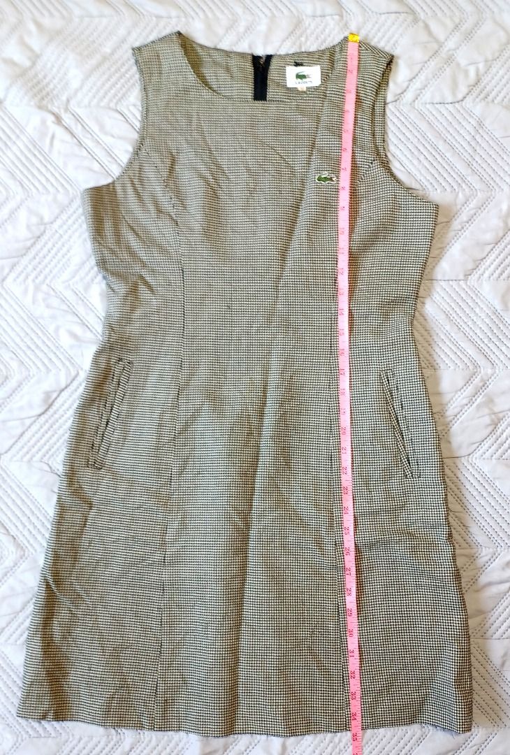 Lacoste Sleeveless Houndstooth Dress (Category: Dresses) located in Pasig City. Submitted by Magdythrift23 (Listing ID 1409923428, Image 3). Description: - Lacoste sleeveless dress - Classic houndstooth pattern - Size 40 - Knee-length - Zipper closure at the back - Lacoste logo on chest _ with side pocket.