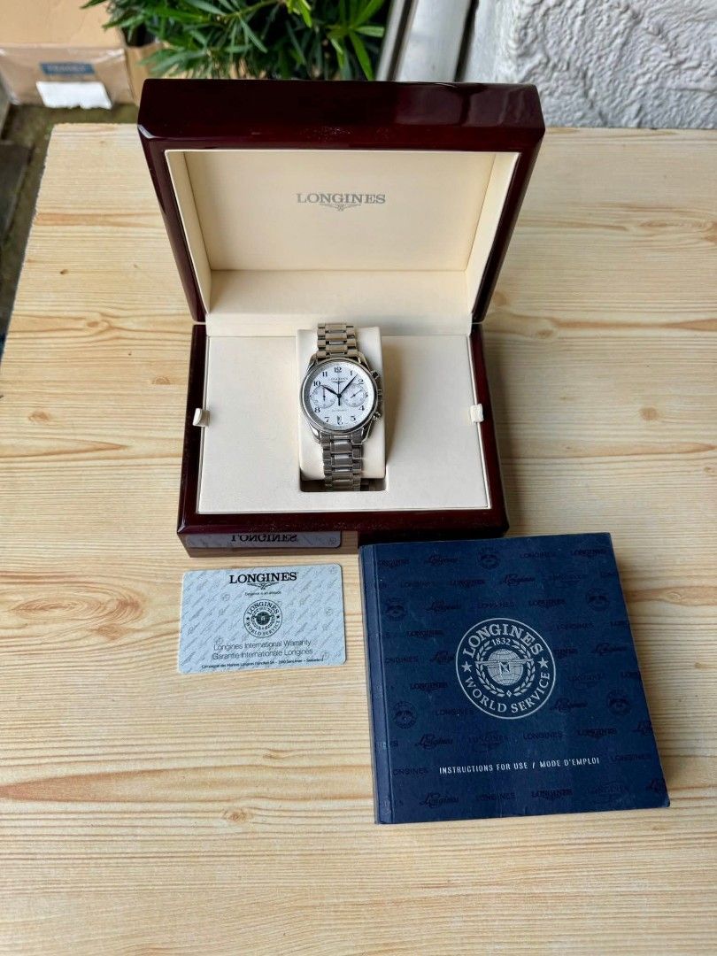 Longines Master Collection Chronograph Automatic Watch (Category: Luxury Watches) located in Taguig. Submitted by jayricafort (Listing ID 1409905649, Image 2). Description: - Longines Master Collection chronograph watch 40mm - Silver dial with chronograph sub-dials - Date display - Automatic movement - Includes original box - Includes warranty card - Includes instruction manual - Stainless steel bracelet - Secure clasp.