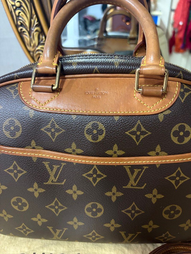Louis Vuitton Monogram Trouville Handbag (Category: Luxury Bags & Wallets) located in Antipolo. Submitted by cherrylblossom (Listing ID 1409969664, Image 2). Description: - Authentic Louis Vuitton Trouville handbag - Iconic Monogram pattern - Dual top handles & detachable shoulder strap - Includes lock and key - Zip closure - Spacious interior - Made in France With Authentication from Poizon .