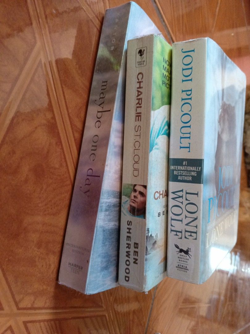 Maybe One Day, Charlie St. Cloud, Lone Wolf Books (Category: Storybooks) located in Alaminos. Submitted by declutteritems2024 (Listing ID 1409865603, Image 2). Description: - "Maybe One Day" by Melissa Kantor (Php75.00) - "Charlie St. Cloud" by Ben Sherwood (Php 25.00) - "Lone Wolf" by Jodi Picoult (Php 60.00) *Bundle Php 150.00 *SF is shouldered by the buyer (Origin: Alaminos City, Pangasinan) *rfs: Change of genre.