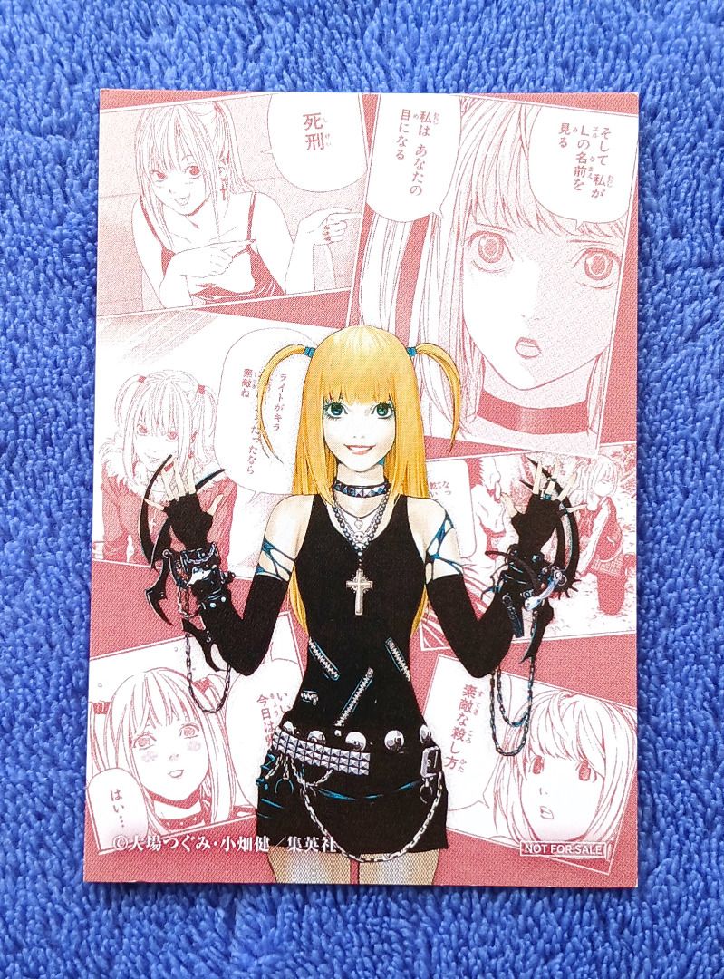 Misa Amane from Death Note Manga Card (Category: Raw Singles) located in Iloilo. Submitted by jrmagallanes78 (Listing ID 1409813625, Image 1). Description: Misa Amane from Death Note illustrated by Takeshi Obata. Card condition is VERY GOOD with minor indentations on front of the card. PhP300 minimum total for processing sale. Buyer can combine choices with other items in other listings to hit this threshold. Dimensions: 59mm x 86mm Material: car