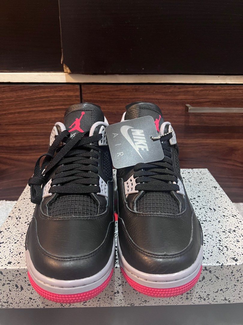 Nike Air Jordan 4 Retro - Black/Fire Red (Category: Sneakers) located in Quezon City. Submitted by ajaaaaa20 (Listing ID 1409920186, Image 2). Description: For sale J4 Bred Brandnew Sizes 9 and 12 10k each nalang Meet up around qc.