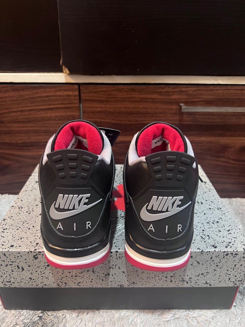 Nike Air Jordan 4 Retro - Black/Fire Red (Category: Sneakers) located in Quezon City. Submitted by ajaaaaa20 (Listing ID 1409920186, Image 1). Description: For sale J4 Bred Brandnew Sizes 9 and 12 10k each nalang Meet up around qc.