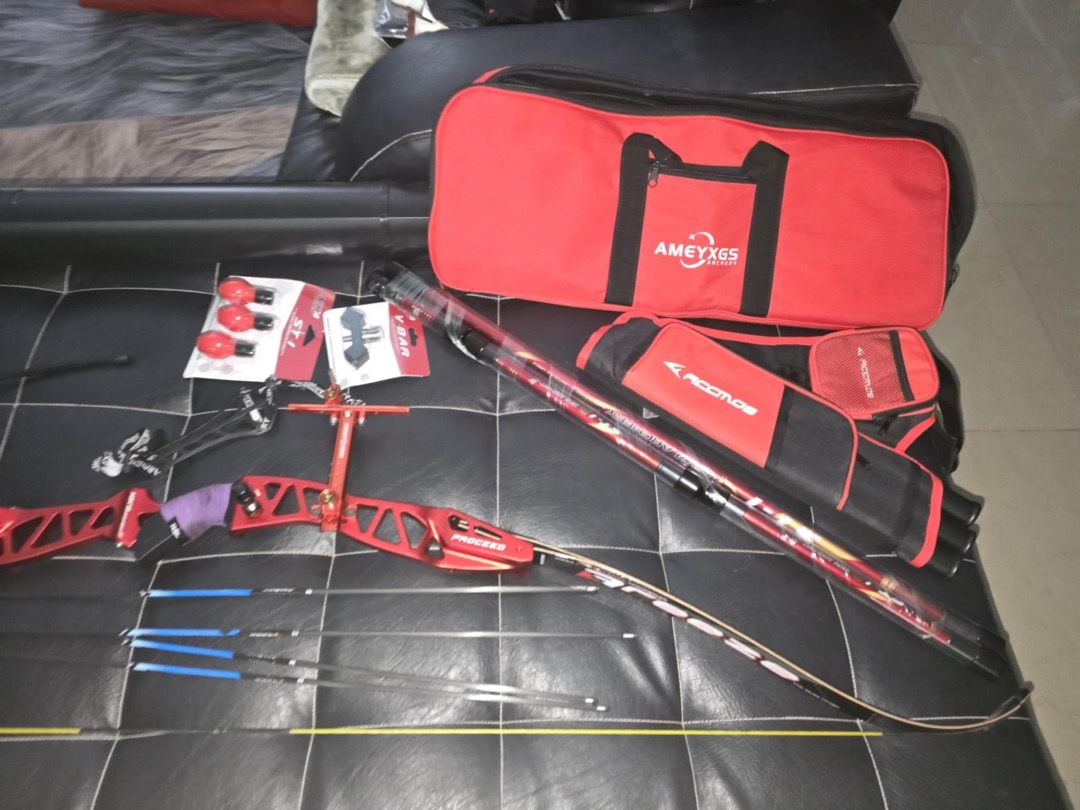 Recurve Bow Archery Set(for left handed) (Category: Other Sports Equipment and Supplies) located in Tarlac. Submitted by alleiz1521 (Listing ID 1409909433, Image 1). Description: Complete archery set including a red akusta recurve bow, arrows, stabilizer, sight, arrow case, bag and accessories. Comes with a red carrying bag and a bow case. Includes additional items such as arrow rests and other small parts. Ready for use. Reason for selling :Owne