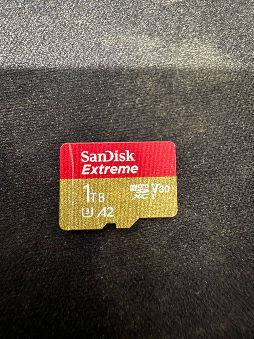 SanDisk Extreme 1TB MicroSD Card (Category: Memory & SD Cards) located in Manila. Submitted by pael92 (Listing ID 1409986818, Image 1). Description: - SanDisk Extreme 1TB microSD card - Fast performance with V30 and A2 ratings - Great for smartphones, tablets, and more - Store photos, videos, and large files - Reliable and durable storage VERY RARELY USED COMES WITH UNIT ONLY .