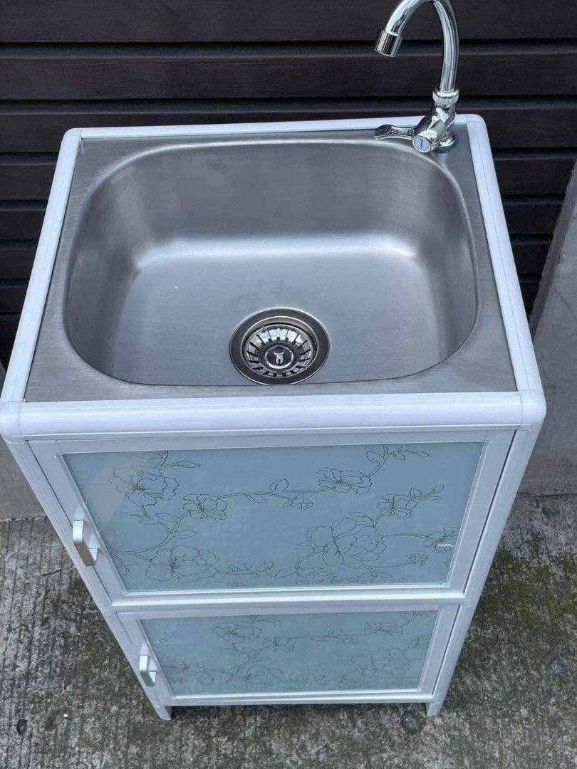 STAINLESS SINK WITH CABINET HEAVY DUTY! (Category: Office Furniture & Fixtures) located in Marikina City. Submitted by beynacatindoy2620 (Listing ID 1409809112, Image 3). Description: STAINLESS SINK WITH CABINET HEAVY DUTY! ✅Size: 46x40x83cm ✅Complete set — faucet & fittings ✅Made by Aluminum frame, stainless steel sink & tempered glass door. ✓ALL BRANDNEW & ONHAND ✓DIRECT WAREHOUSE ✓CASH ON DELIVERY ADD SHIPPING FEE ✓SAMEDAY DELIVERY 🛵 ✓PM FOR 