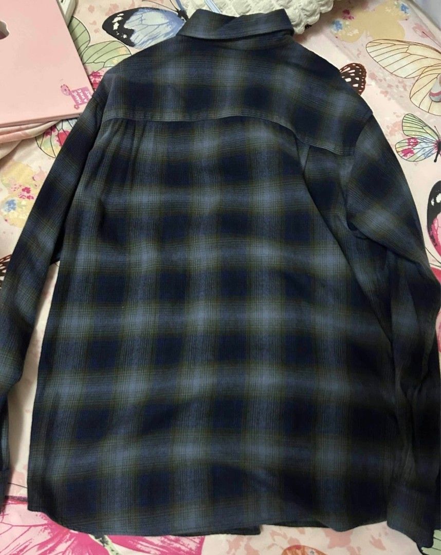 Uniqlo Flannel (Category: Tshirts & Polo Shirts ) located in Quezon City. Submitted by declutteric (Listing ID 1409876329, Image 2). Description: - Uniqlo long sleeve shirt - Classic blue and green plaid pattern - Button-down front - Collared neckline - Comfortable fabric - Versatile for casual wear Perfect pamorma sa Christmas party or other events Slightly nego pa Meetup around QC or ship via Lalamove.