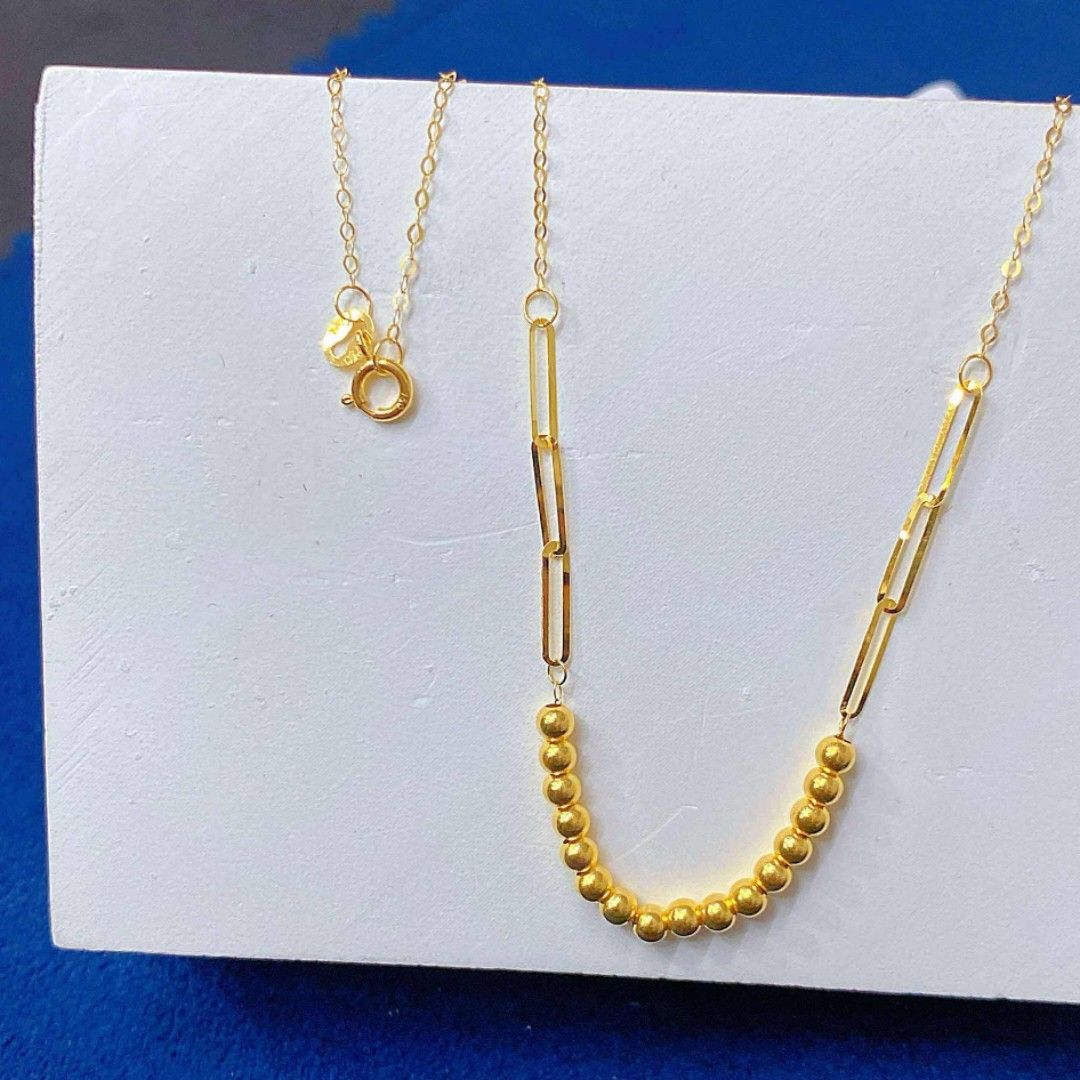 18K Saudi Gold Link & Bead Necklace (Category: Necklaces) located in Manila. Submitted by velvetfox (Listing ID 1410040197, Image 1). Description: Experience modern elegance with this stunning 18k Saudi gold necklace. Featuring a unique design with elongated links and a delicate arc of gold beads, this piece adds a touch of sophistication to any outfit. Perfect for those who appreciate minimalist yet eye-catching jewelry. 💯Pawnable/ Nasasangla �