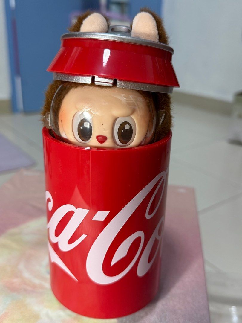 2 Labubu (Category: Designer & Blind Box Toys) located in Singapore. Submitted by joeylly123 (Listing ID 1410172055, Image 2). Description: Labubu × Coca-Cola 联名（The Monsters Vinyl Face Labubu – Rock The Universe（THE MONSTERS） .