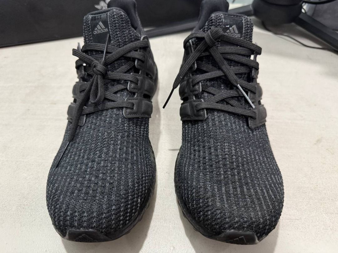 Adidas Ultraboost 4.0 DNA Triple Black (Category: Sneakers) located in Manila. Submitted by pael92 (Listing ID 1410175901, Image 3). Description: - Adidas Ultraboost sneakers - Color: Black - Features the iconic three stripes - Ultraboost branding on the heel - Black laces and sole - Knit upper material - Modern and versatile design USED ONLY ONCE MINT CONDITION.