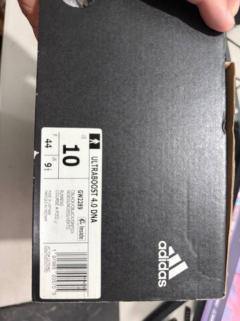 Adidas Ultraboost 4.0 DNA Triple Black (Category: Sneakers) located in Manila. Submitted by pael92 (Listing ID 1410175901, Image 2). Description: - Adidas Ultraboost sneakers - Color: Black - Features the iconic three stripes - Ultraboost branding on the heel - Black laces and sole - Knit upper material - Modern and versatile design USED ONLY ONCE MINT CONDITION.