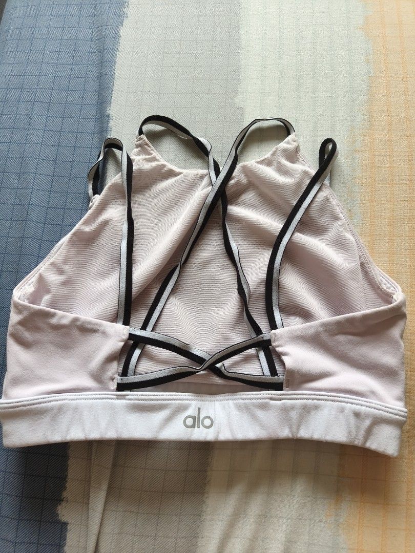 Alo Yoga Pink Sports Bra XS (Category: Activewear) located in Singapore. Submitted by 1123cpp (Listing ID 1410045184, Image 2). Description: - Alo Yoga sports bra - Soft pink color - Size: XS - Stylish criss-cross back design - Comfortable fit - Made in Vietnam - Ideal for yoga, workouts, and everyday wear.