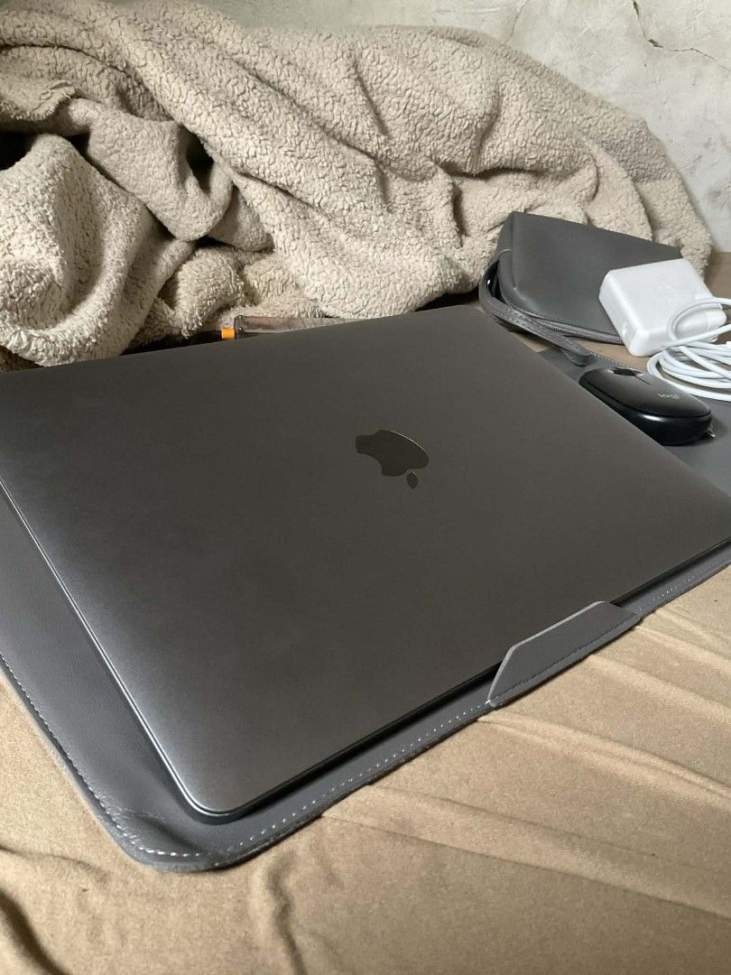 Apple MacBook Charger, Mouse, Hub, and Accessories (Category: Laptops & Notebooks) located in Pasay City. Submitted by alexocrenas75 (Listing ID 1410026318, Image 2). Description: - Apple MacBook Charger (white adapter, USB-C cable) - Black Logi Mouse - Multi-port USB Hub - Gray Laptop Sleeve - Headset.