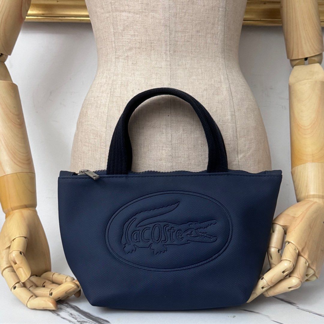 Authentic lacoste mini handbag (Category: Luxury Bags & Wallets) located in Rizal. Submitted by houseofbell (Listing ID 1410107029, Image 1). Description: .